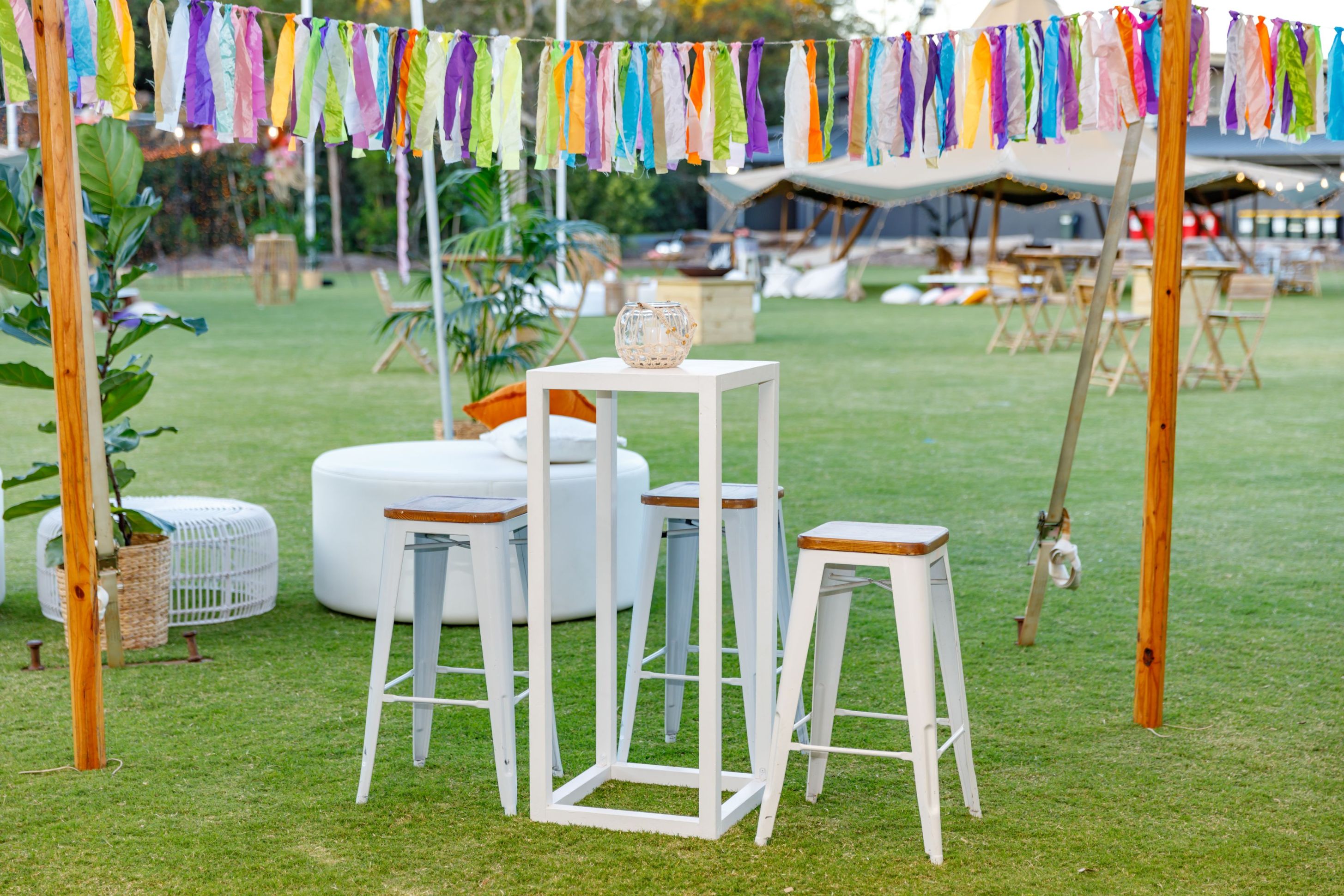 White open high bar and tolix stools