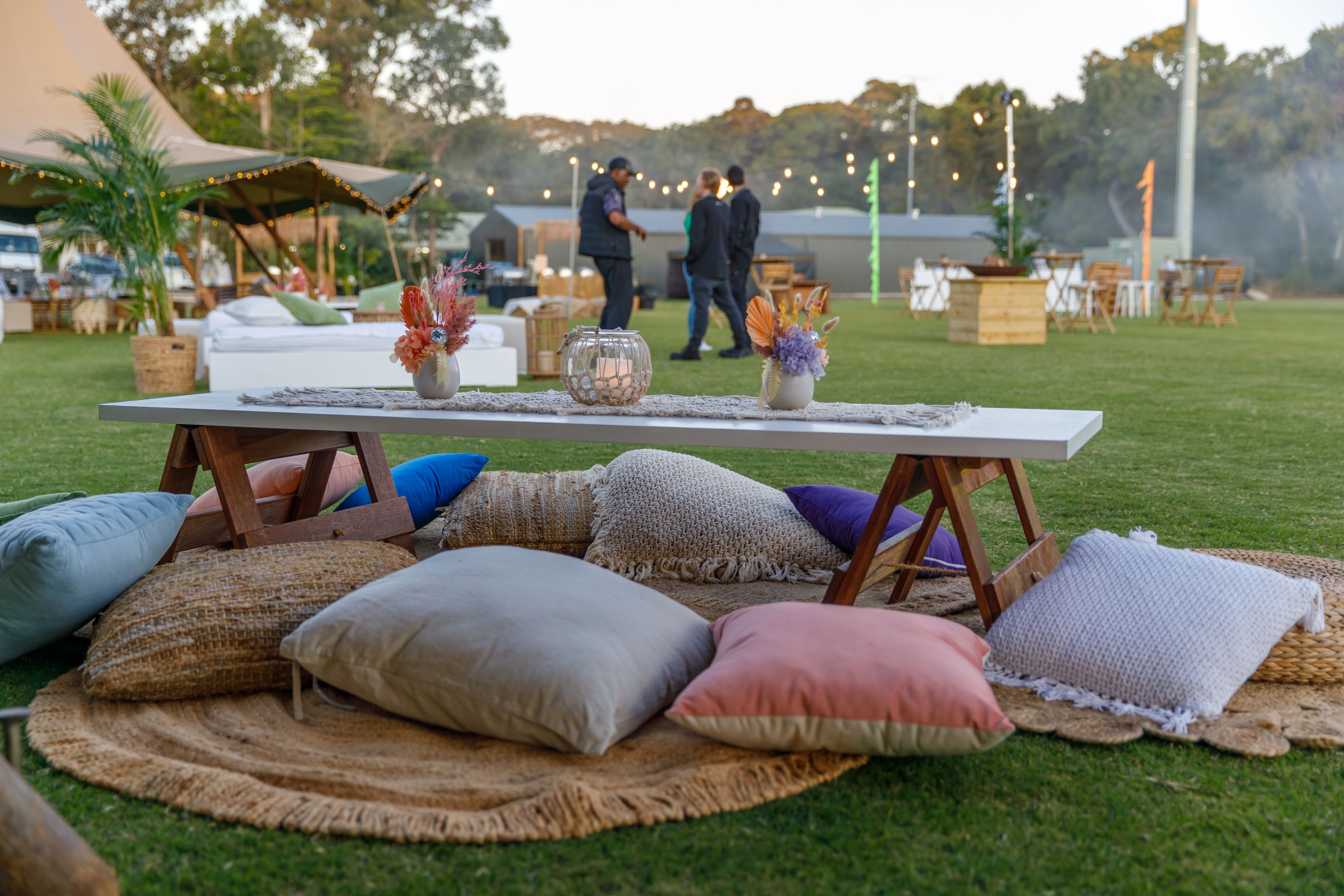 Low white picnic setting with cushions