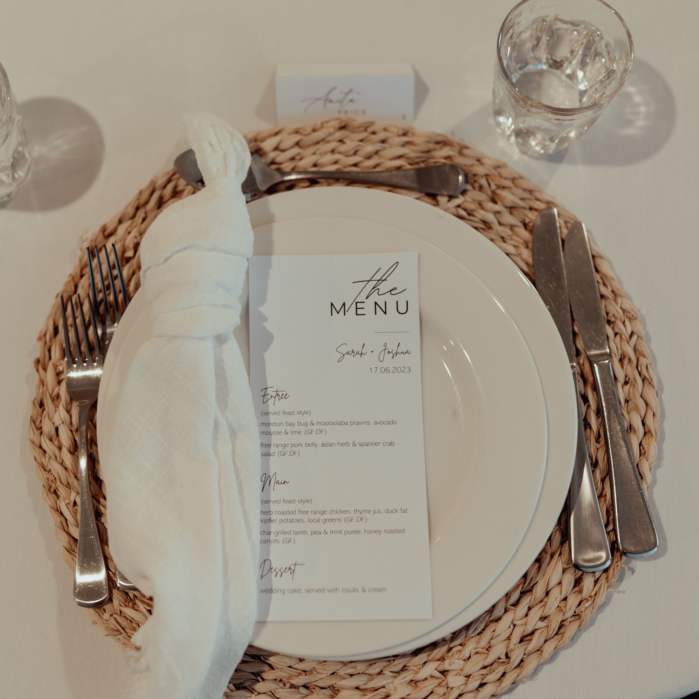 White woven charger with white napkin