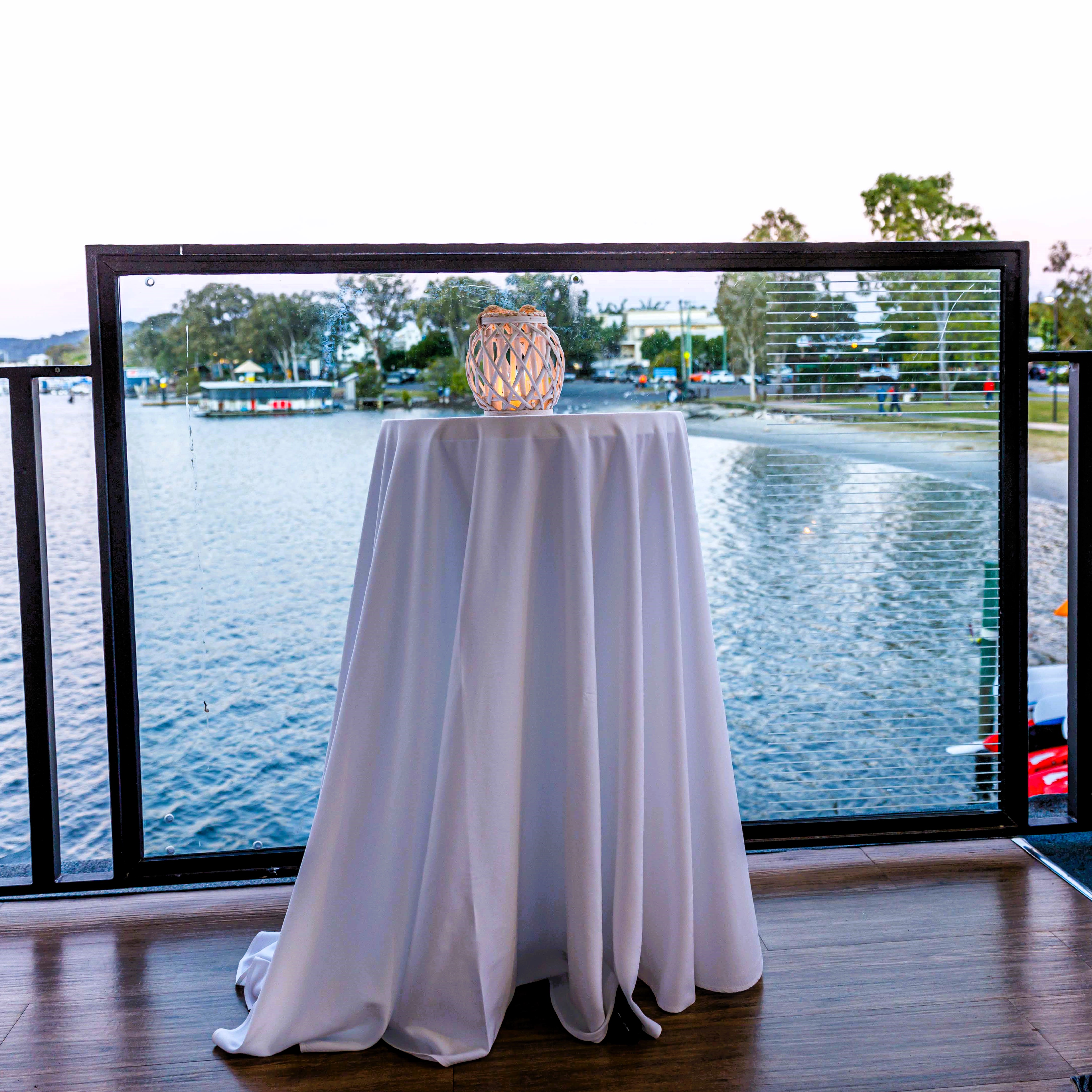 Hig bar cocktail table with white tablecloth