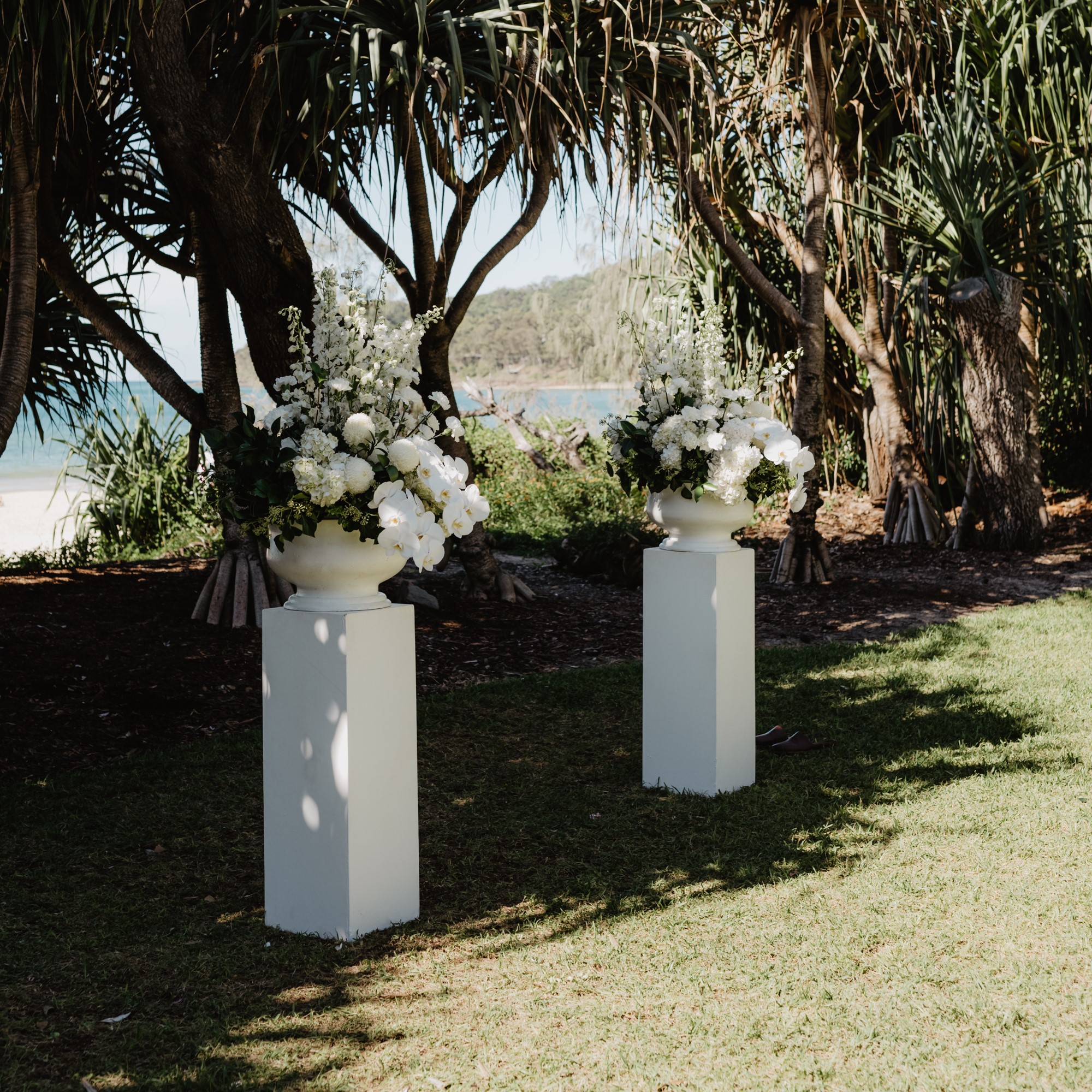 White timber plinths