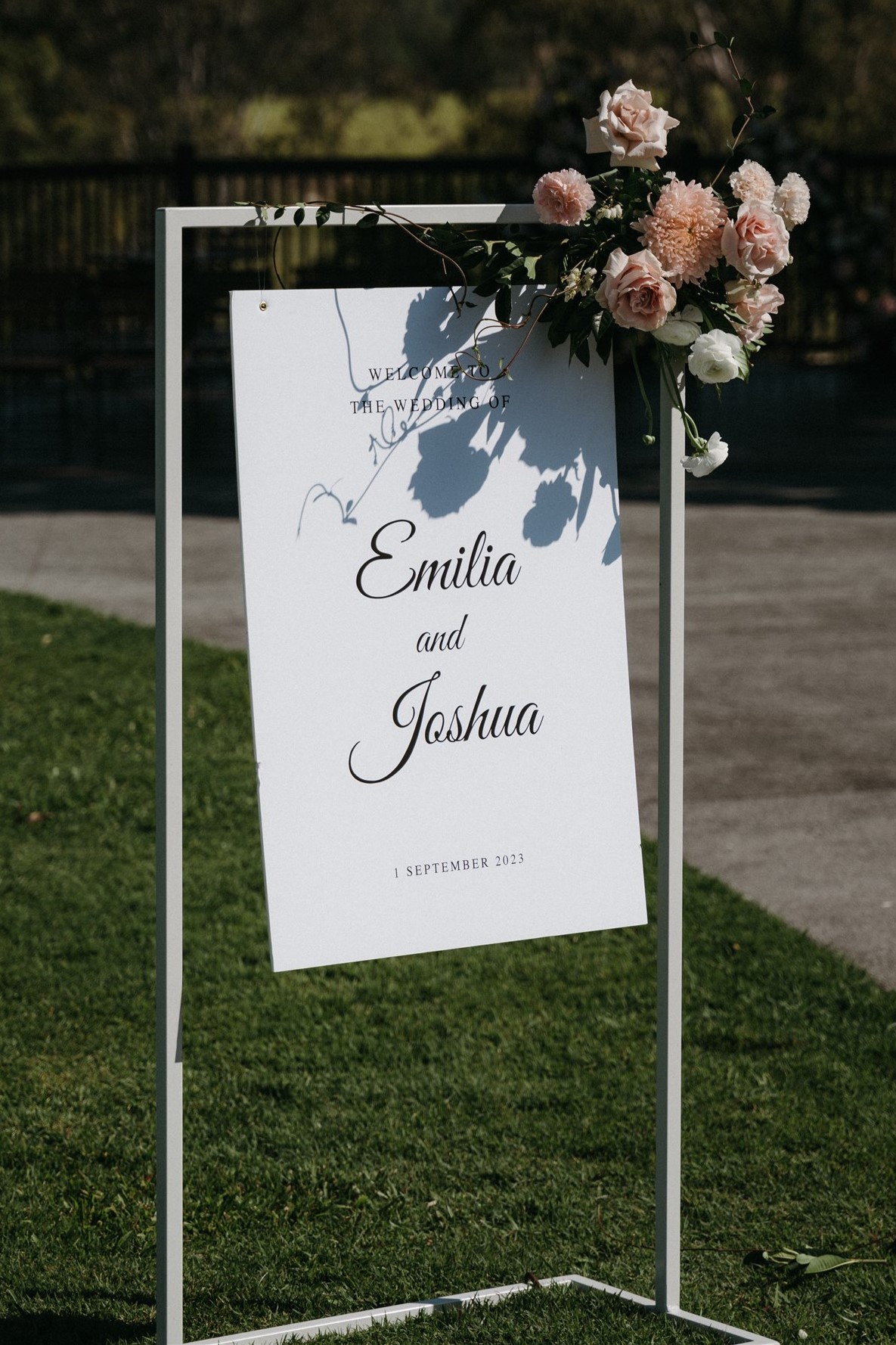 Welcome sign on white stand1