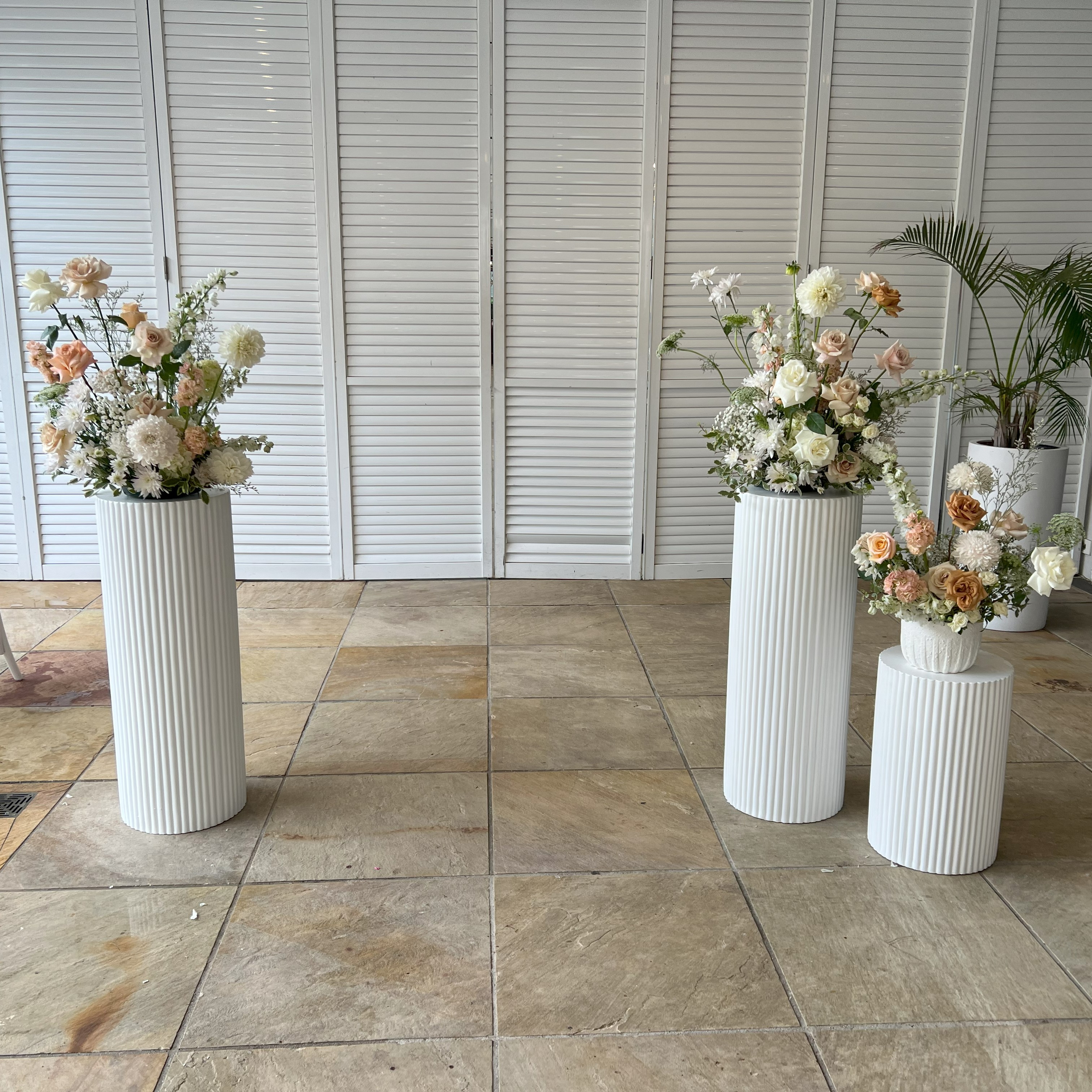 White ribber plinths with floral