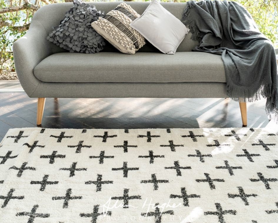 Hire Black cross rug 