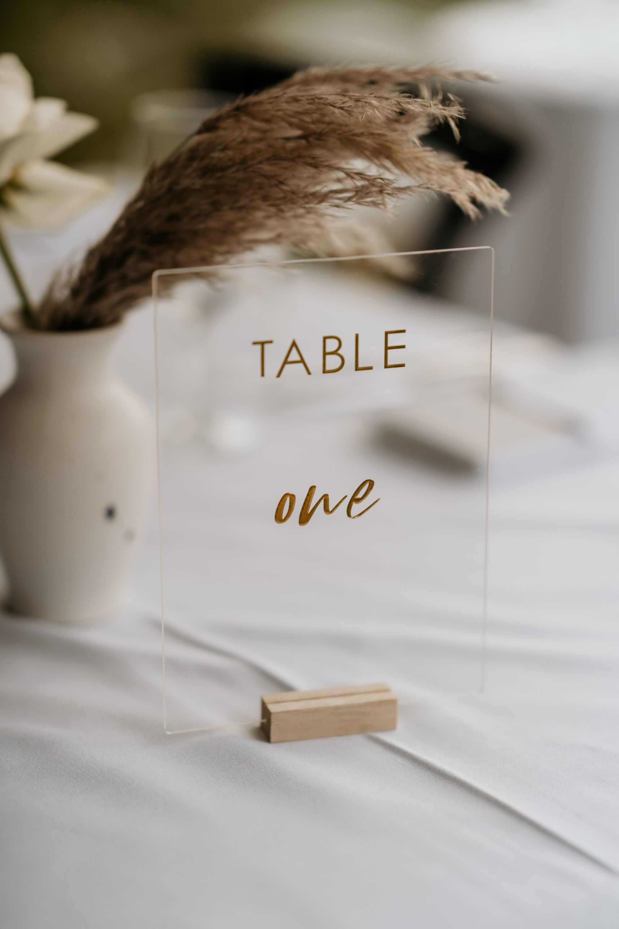 Hire Acrylic table numbers with gold script 