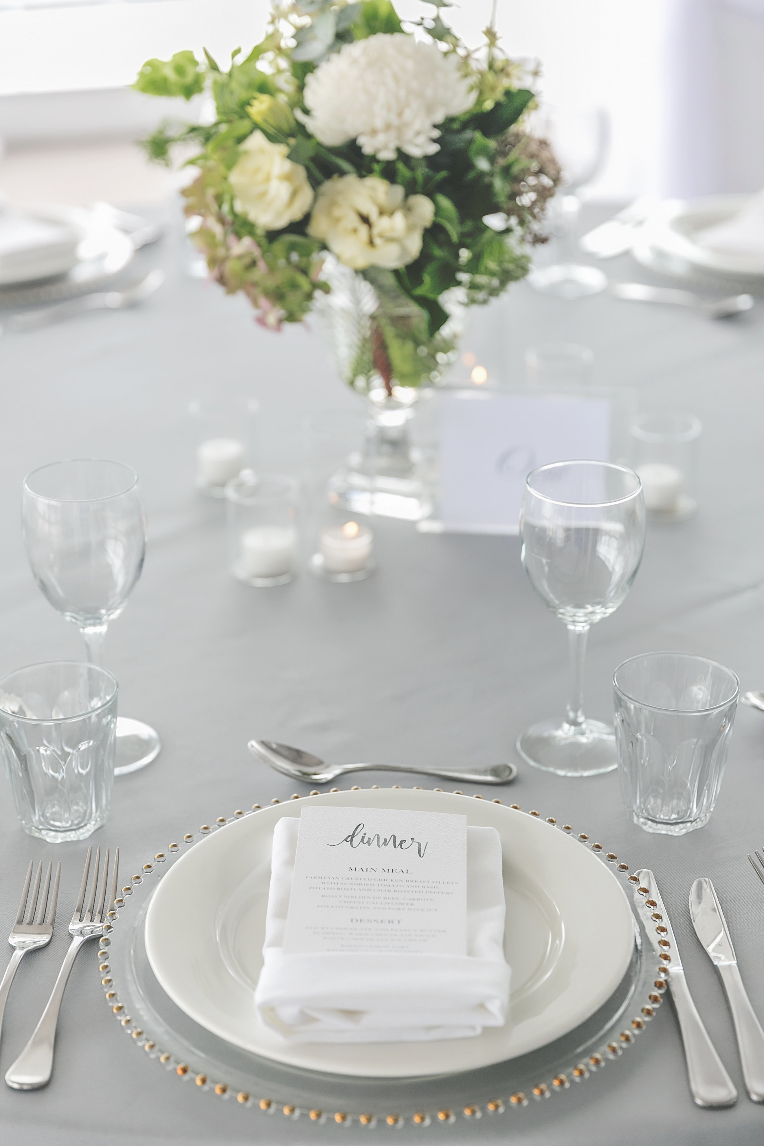 Hire Grey round tablecloth 