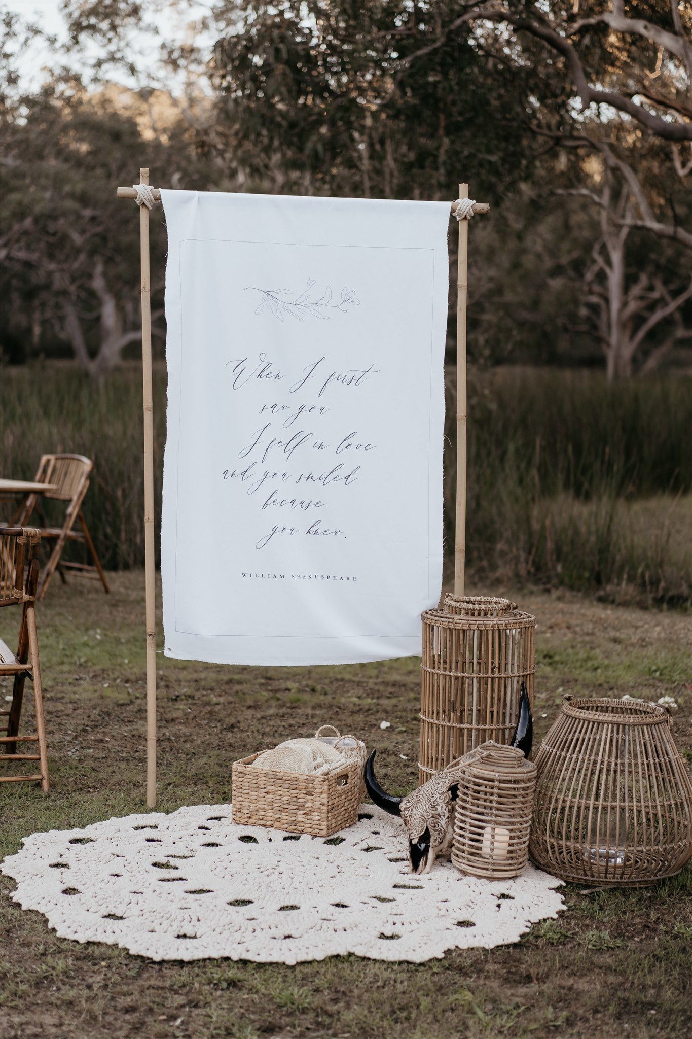 Hire Canvas welcome sign on bamboo frame 