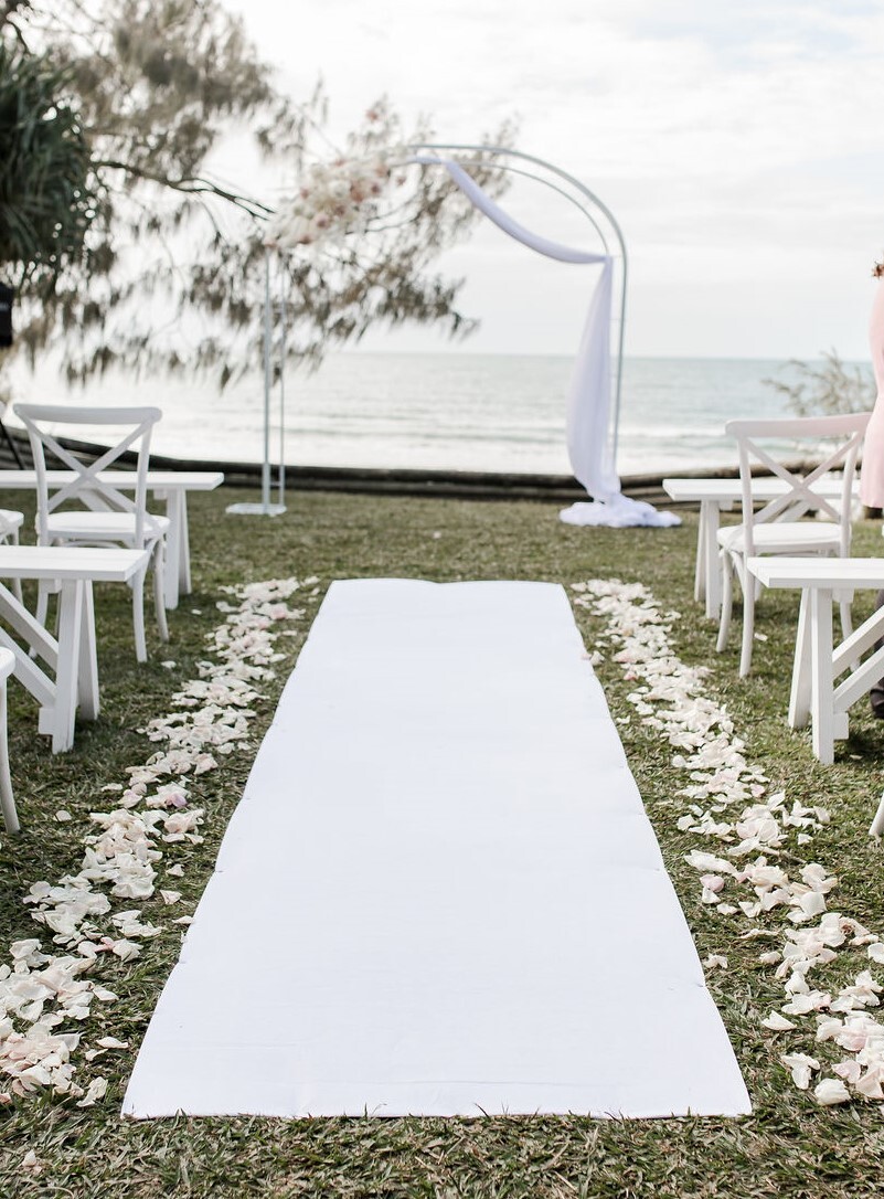 Hire White non-woven carpet runner with petals 