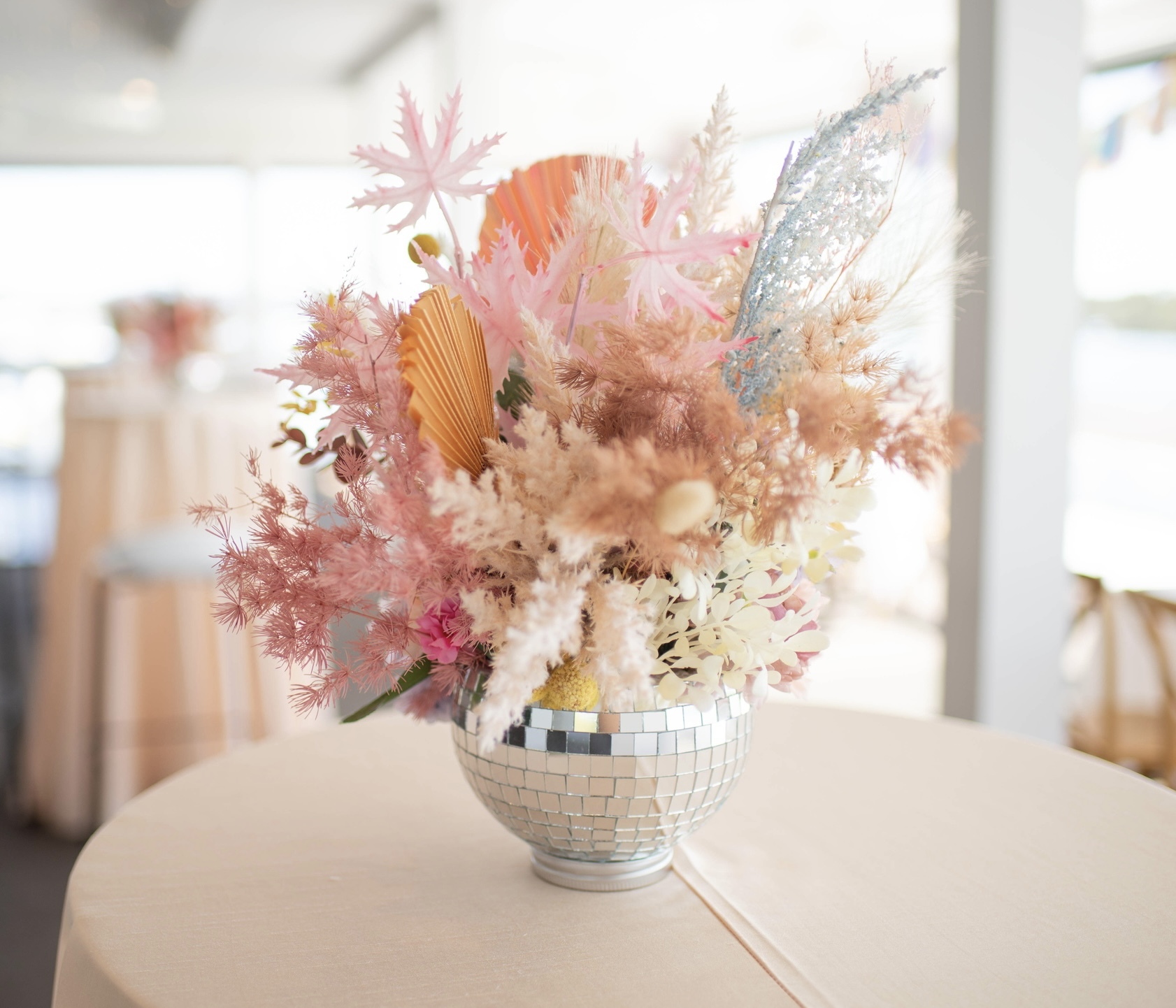 Hire Disco balls with dried floral 