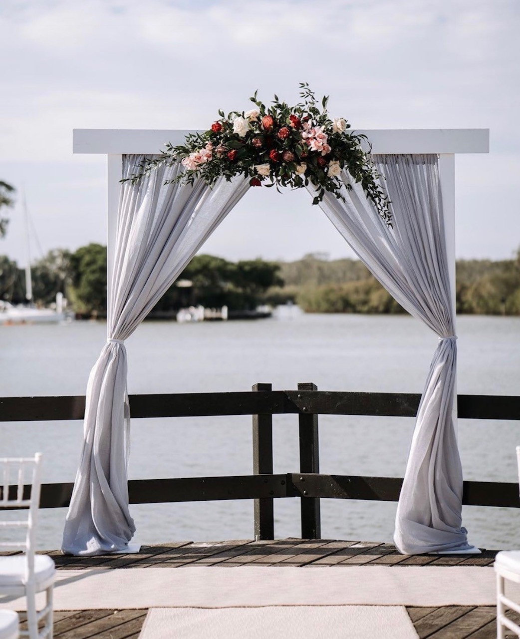 Hire White timber arbour with grey linen curtains 