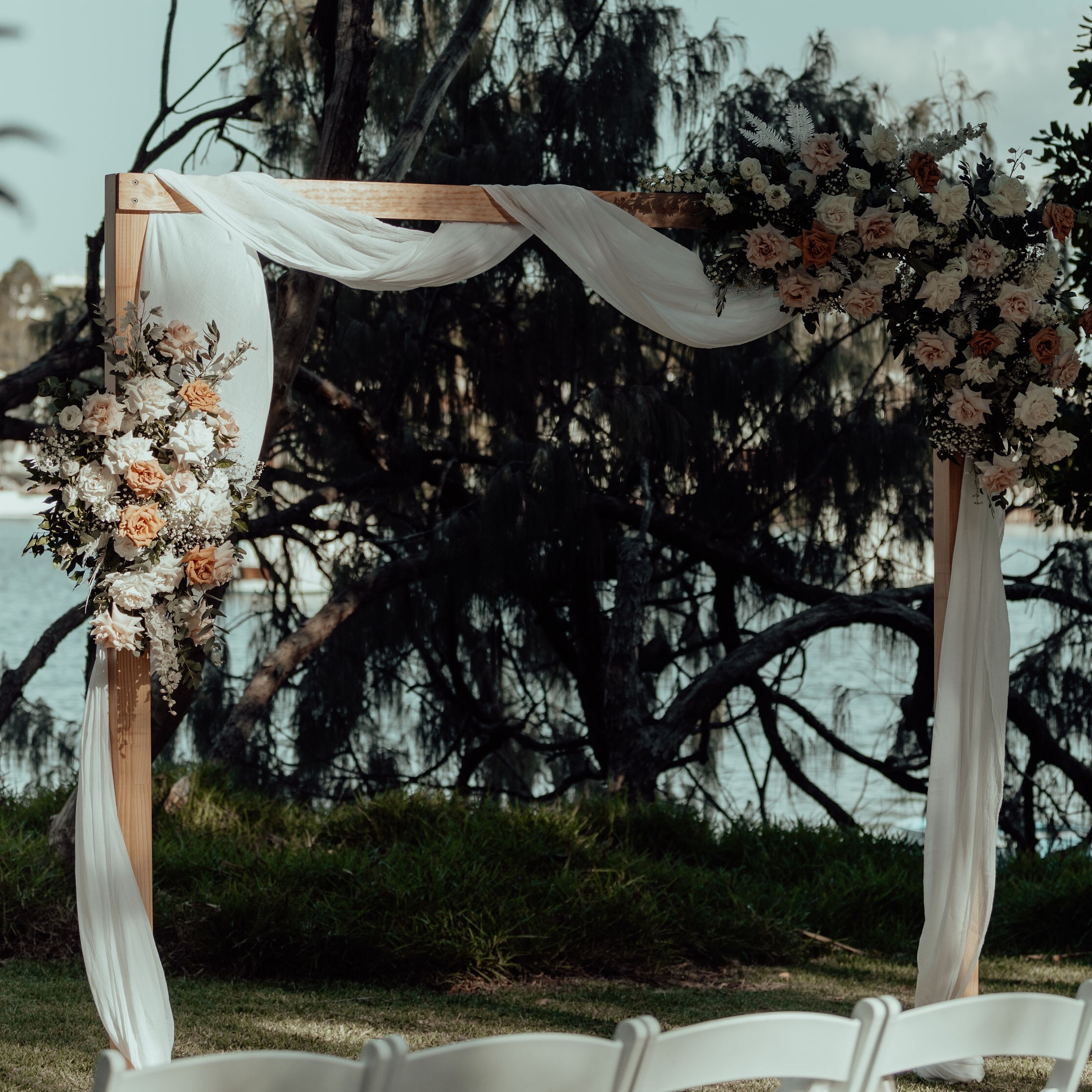 Hire Timber frame arbour with muslin swag 